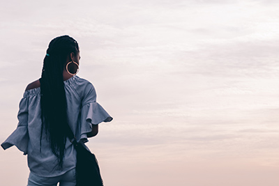 Women in front of sunset