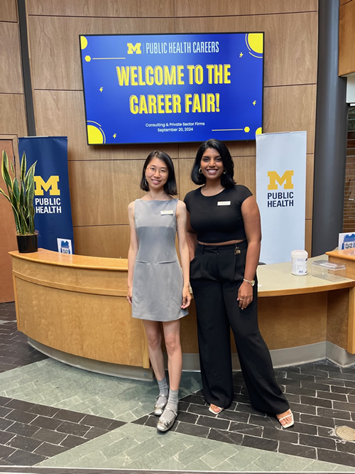 Students, employers, and staff interacting at the Michigan Public Health Career Fair