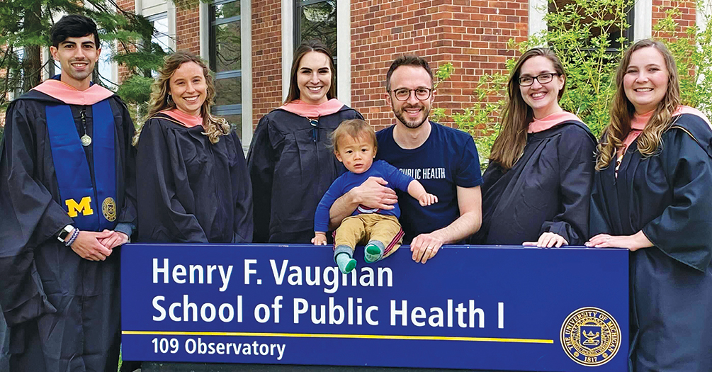  Michigan Public Health’s first online MPH cohort (l-r): Adam Kollipara, Elizabeth Brueggeman, Melanie Berent, Christopher Rudski (and son), Kathy Heselschwerdt, and Maelyn Bremer. University Michigan