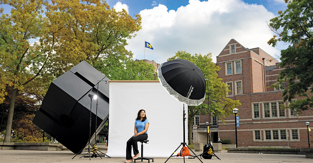 image of student in front of photoshoot set up