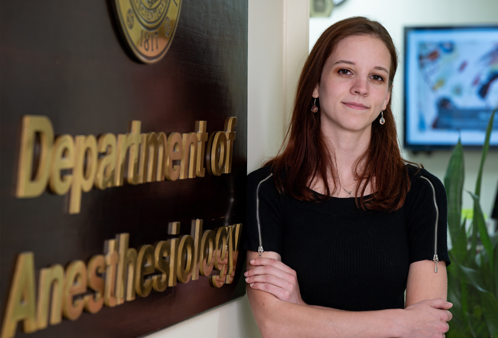 London Kozlowski in front of the Department of Anesthesiology at Michigan Medicine.