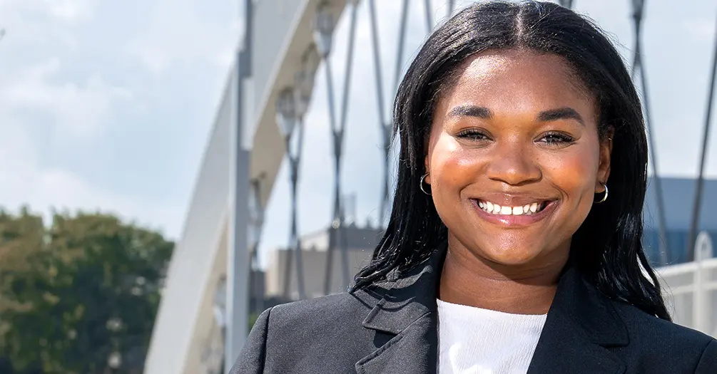Jessica Holloway in front of the 2nd Avenue bridge near the Edsel Ford Highway in Detroit.