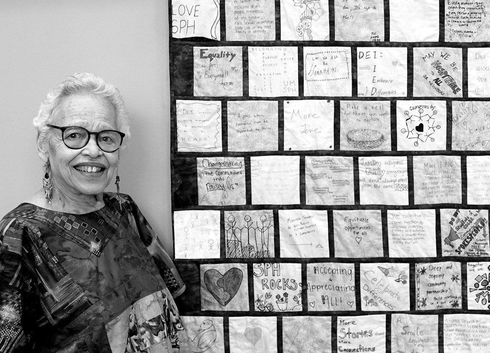 Theadra Fleming pictured with the quilt