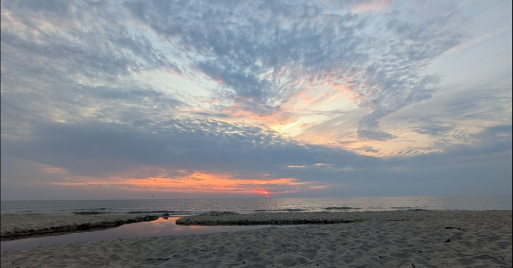 A photo of the view from the last beach I visited, located in western Michigan, at the end of this past summer. I am looking forward to our view in a few months in Grenada!