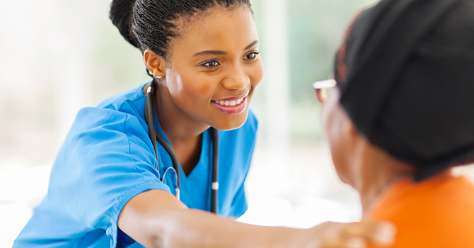 Health care provider working with a patient