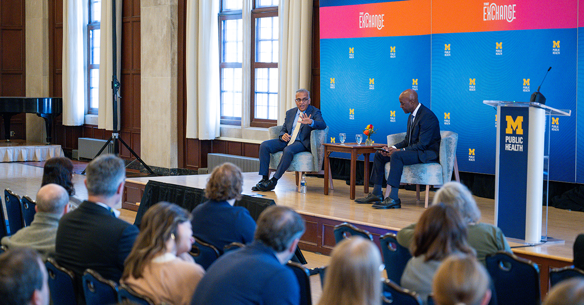 Dr. Ashish Jha, left, and Dean F. DuBois Bowman on the stage at The Exchange event