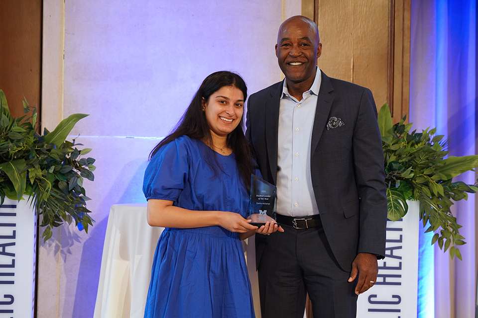 School of Public Health Dean F. DuBois Bowman, right, with Student Leader of the Year Award: Eesha Acharya, who received the Student Leader of the Year Award 