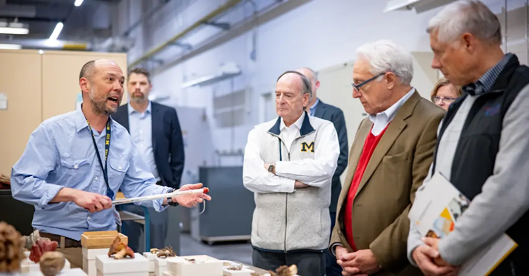 Fred Upton, far right, and others on a tour of the Museum of Zoology