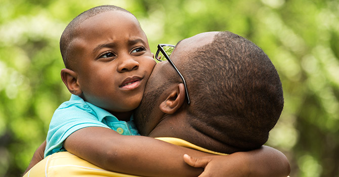 Son hugging his dad